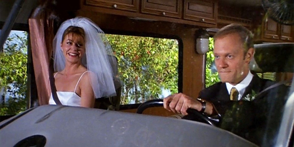 Daphne in her wedding dress in a van with Niles in Frasier