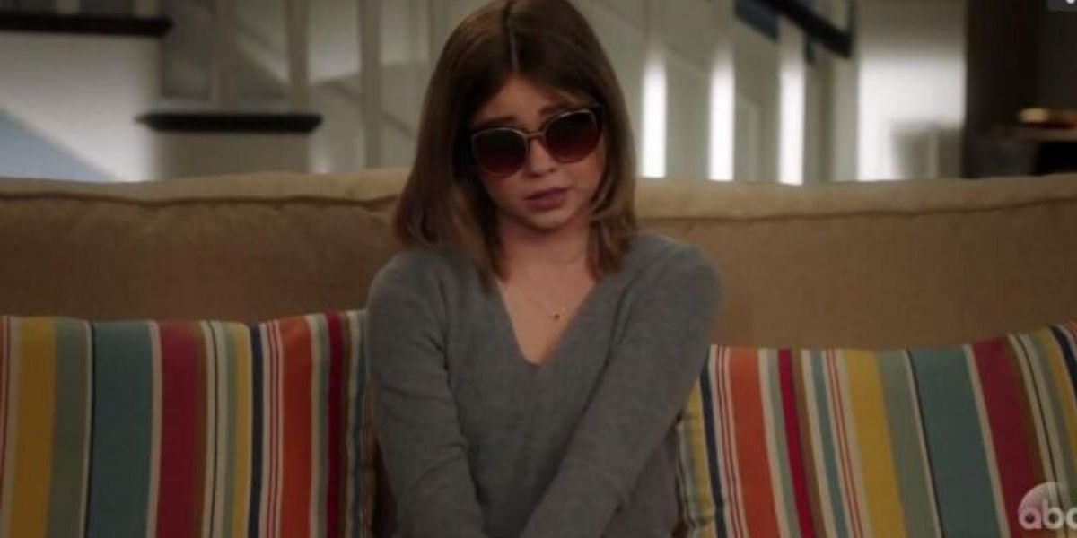 Haley wearing black shades during her interview in Modern Family