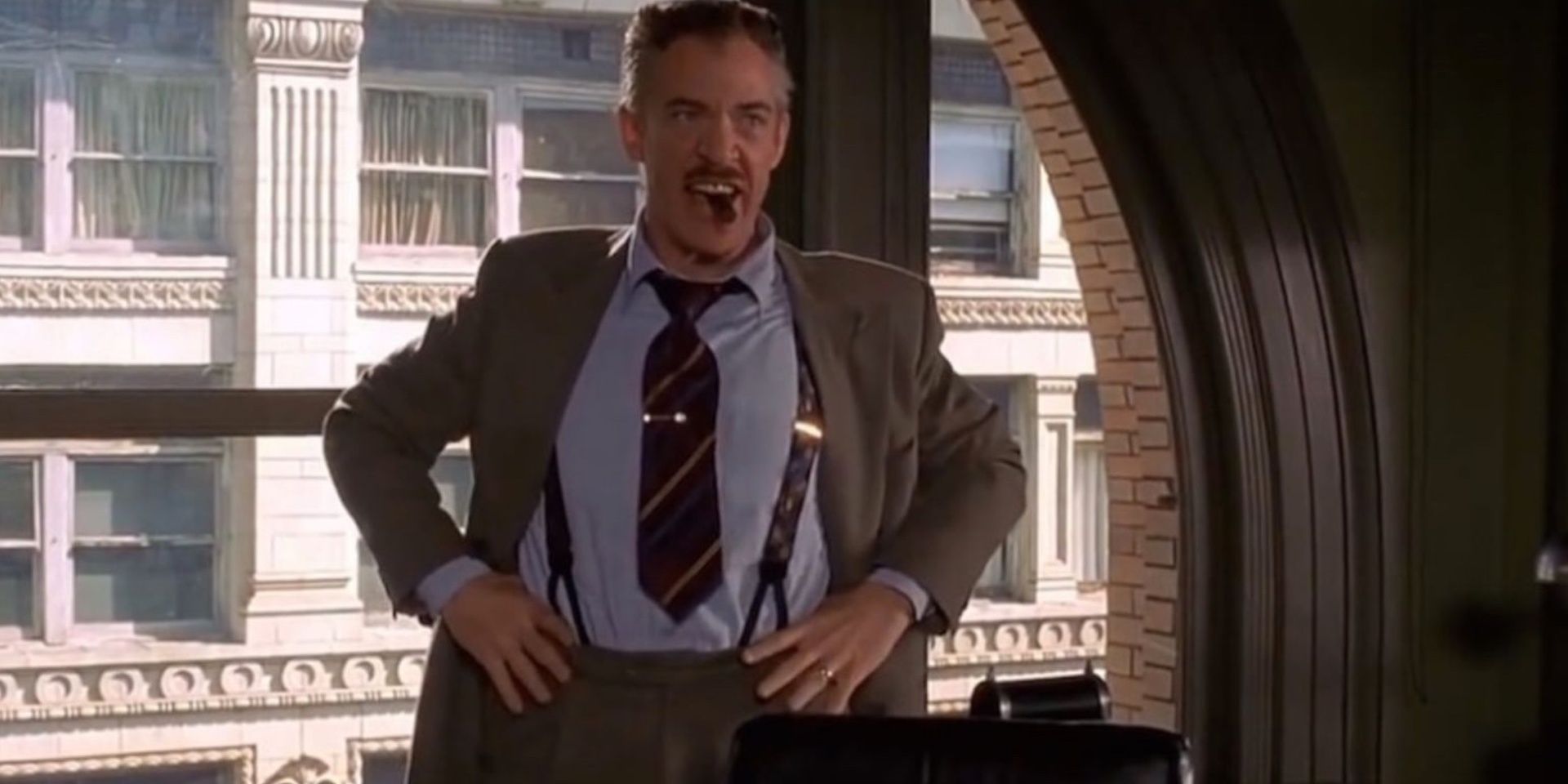 J. Jonah Jameson with his hands on his hips in Spider-Man 2