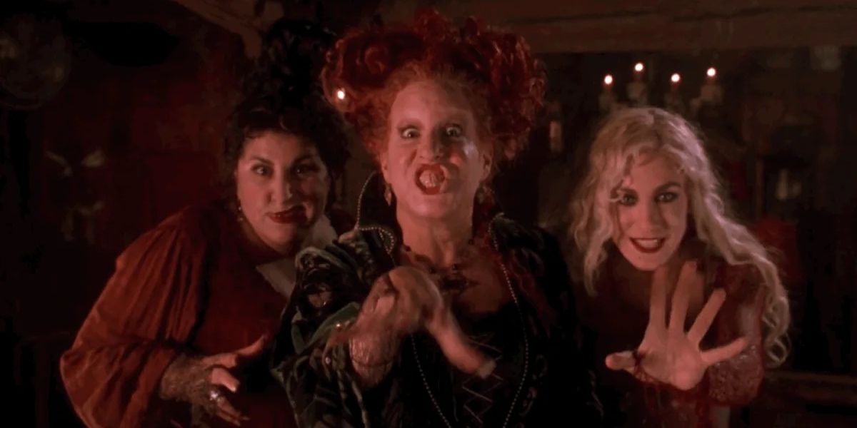 The Sanderson sisters casting a spell on Hocus Pocus