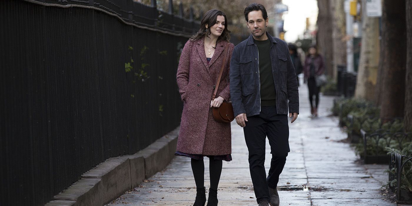Miles and Kate walk down a street in Living with Yourself