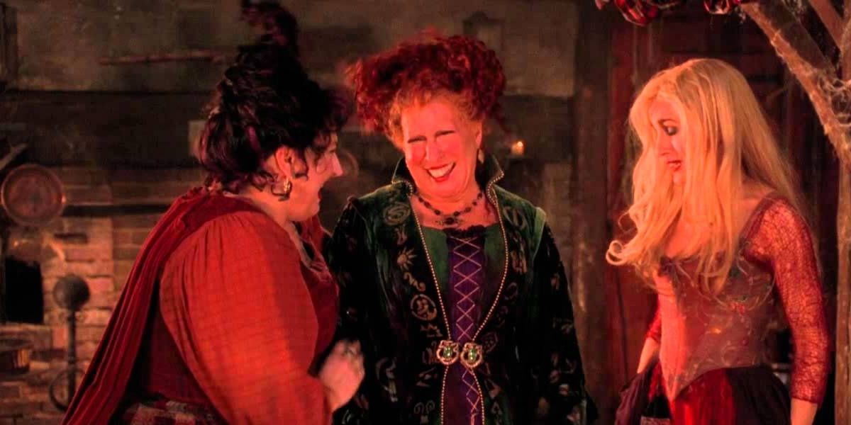 The Sanderson sisters laughing on Hocus Pocus