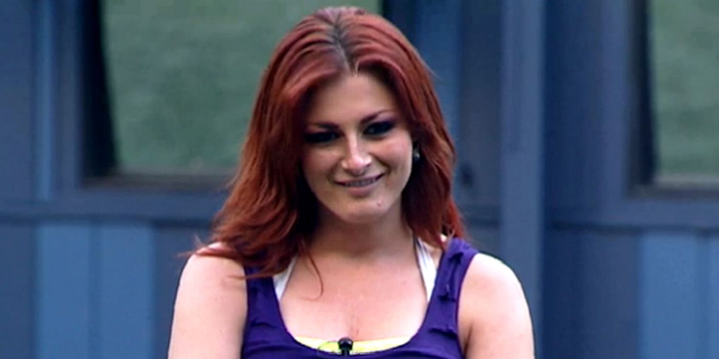 Rachel from Big Brother outside with a smirk on her face.