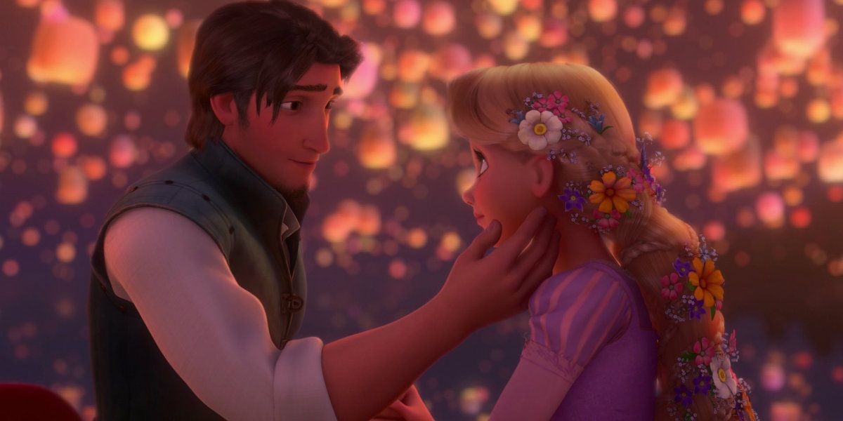 Rapunzel and Flynn about to kiss surrounded by lanterns in Tangled.