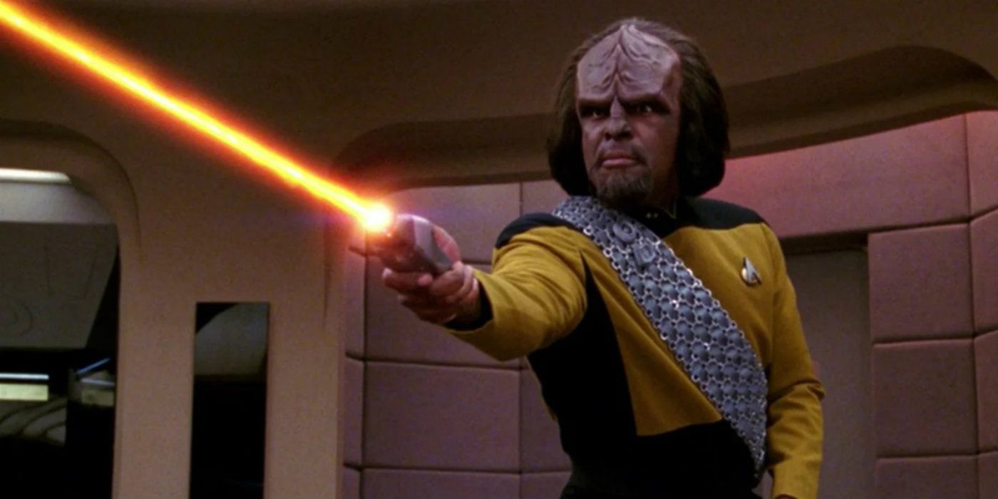 Michael Dorn as Lt. Worf firing his phaser on the bridge of the Enterprise