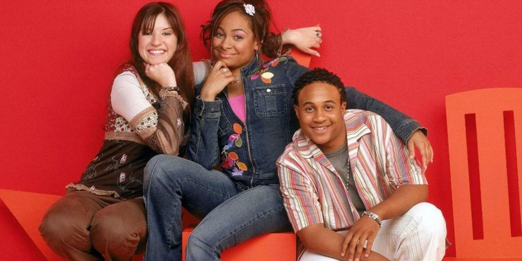 Cast of That's So Raven in front of a red background.