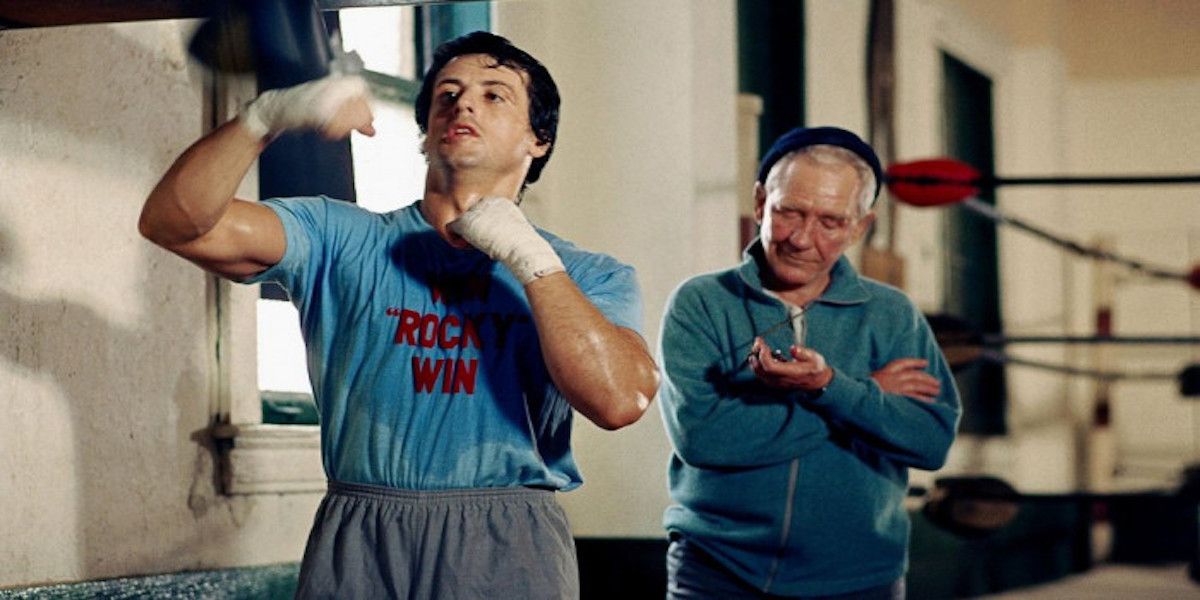Rocky hitting a speed bad as Mickey times him in Rocky III