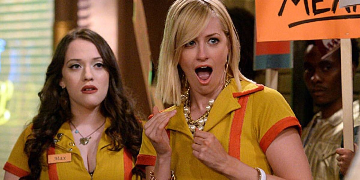 Kat Dennings and Beth Behrs reacting to something in 2 Broke Girls