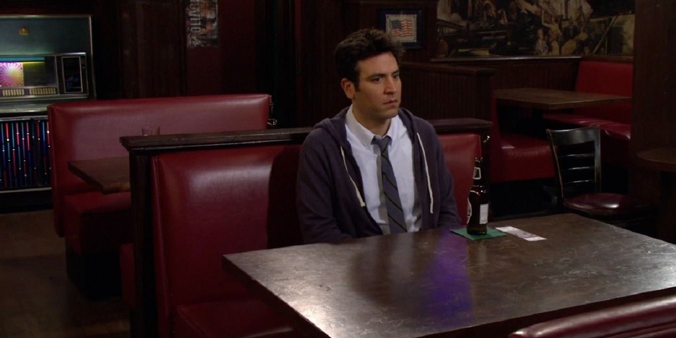Ted sits alone with a Robots vs Wrestlers ticket in How I Met Your Mother