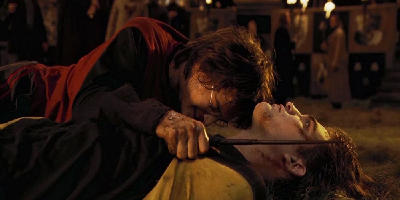 Harry clutching Cedric's body in Harry Potter