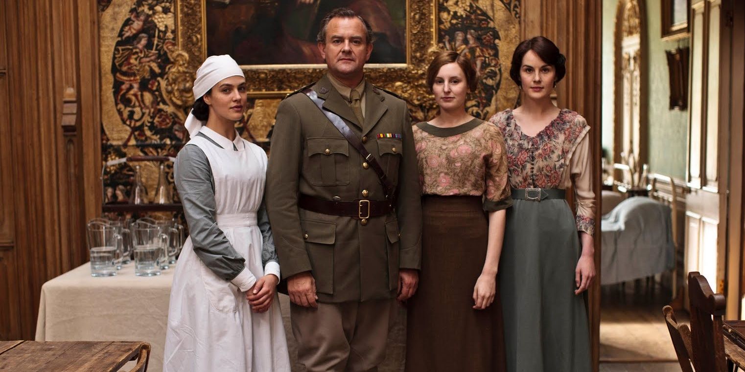 Sybil, Robert, Edith and Mary stood together in Downton Abbey
