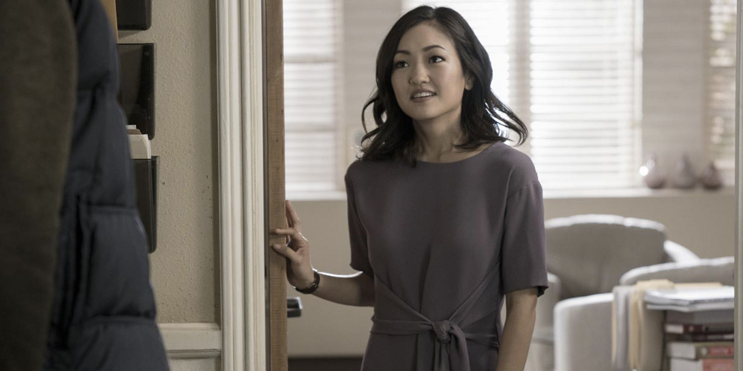 Julia Sasaki opens the door to her therapist's office in Atypical