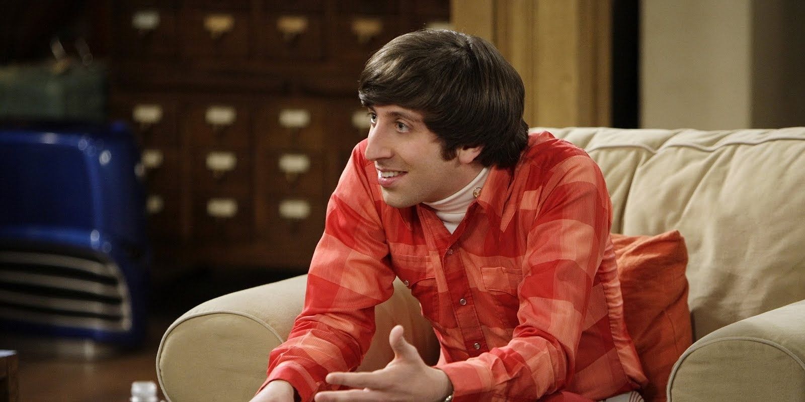 Howard Wolowitz sitting in Leonard and Sheldon's living room in The Big Bang Theory