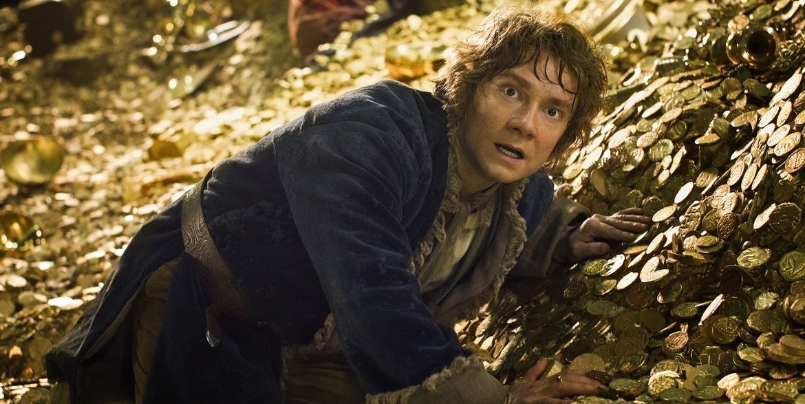 Bilbo Baggins in a pile of gold in The Hobbit The Desolation of Smaug