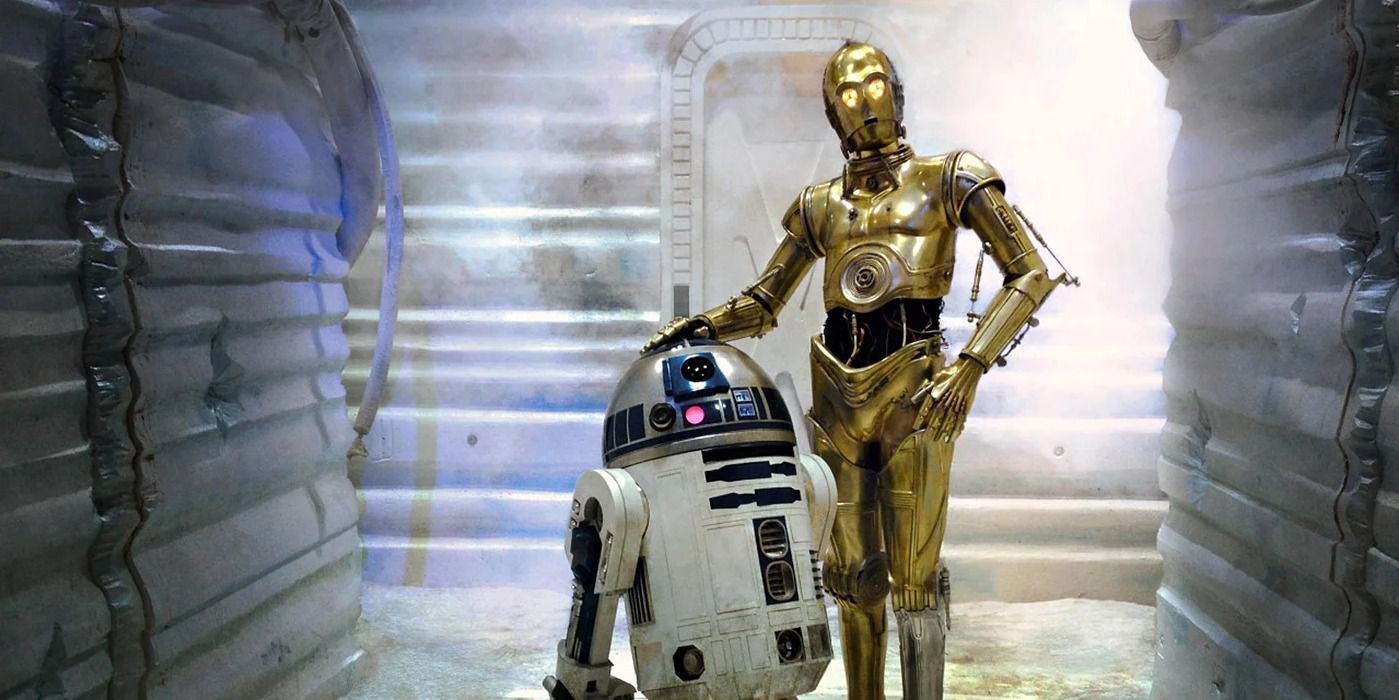 R2-D2 and C-3PO look down a hallway