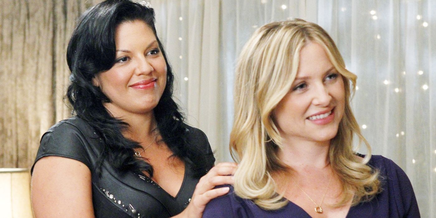 Callie with a hand on Arizona's shoulder in Grey's Anatomy