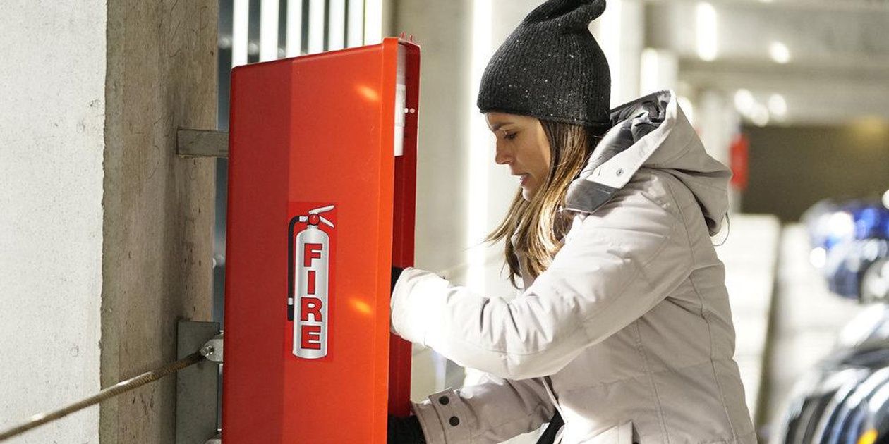 Natalie tries to grab a fire extinguisher in Chicago Med episode &quot;The Ground Shifts Beneath Us&quot;