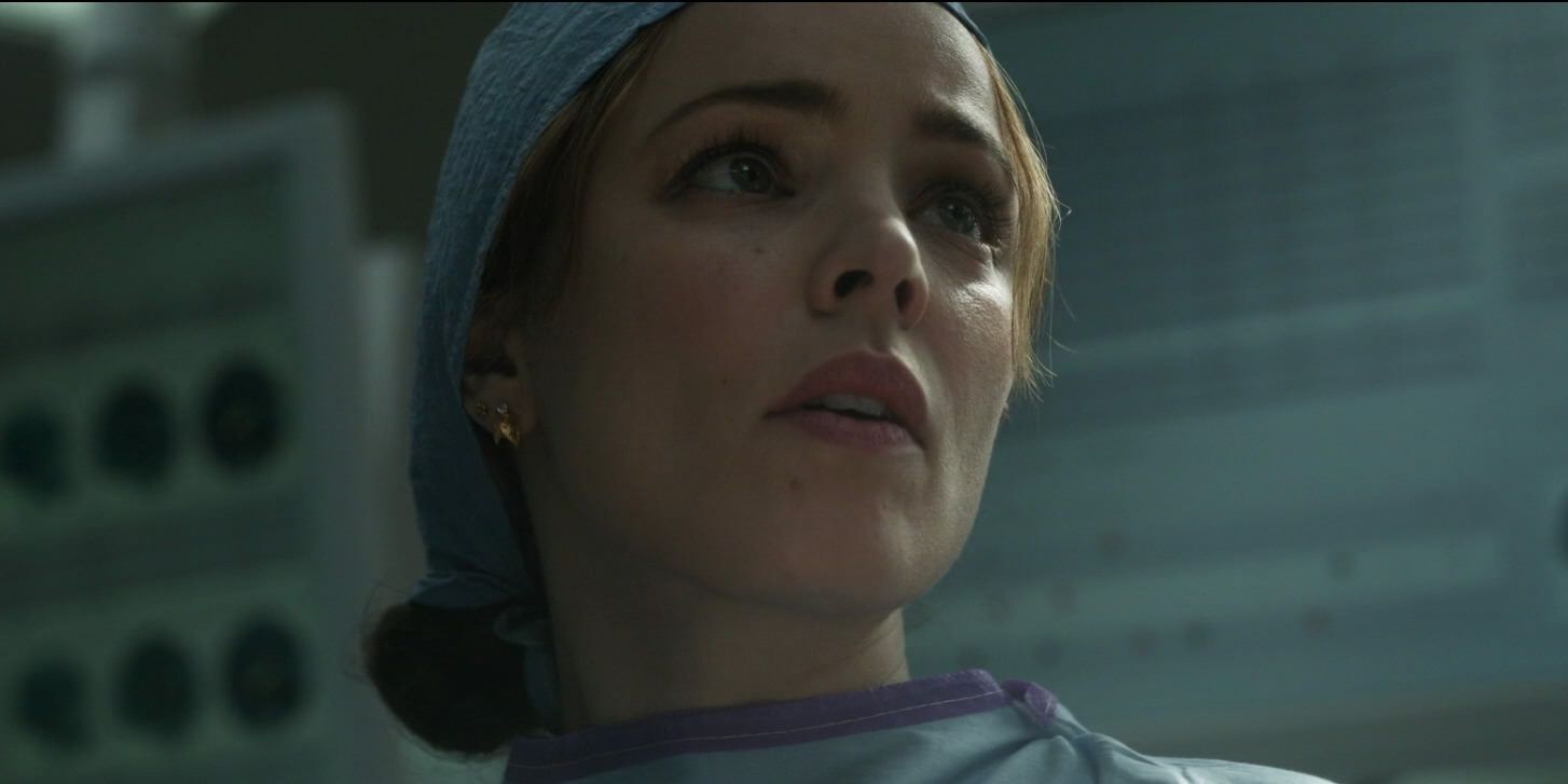 Christine in scrubs looking up in Doctor Strange