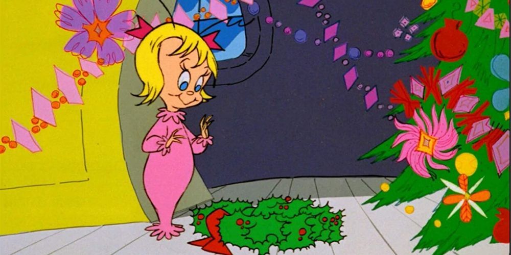 Cindy Lou Who decorando para o Natal em O Grinch