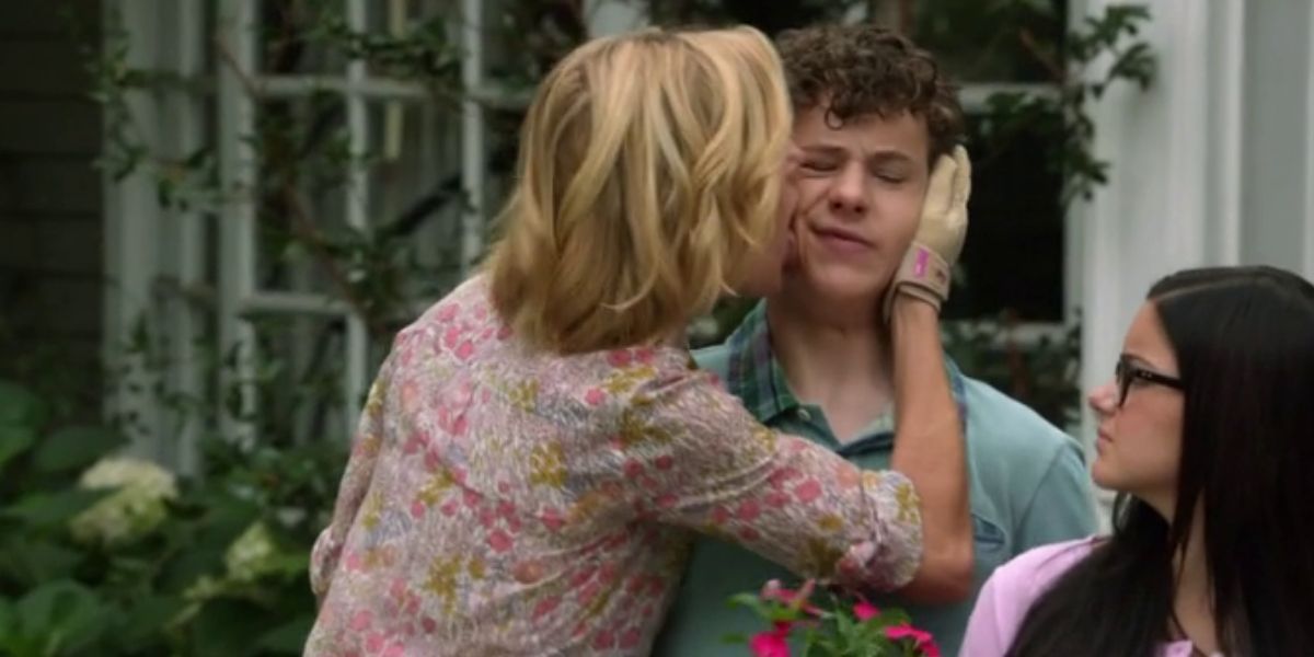 Claire licks her son's face on Modern Family