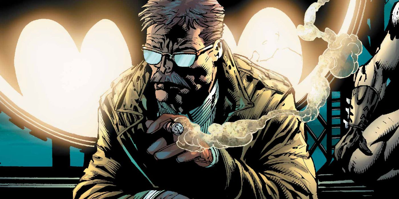 Commissioner Gordon waiting in front of the bat-signal in dc comics
