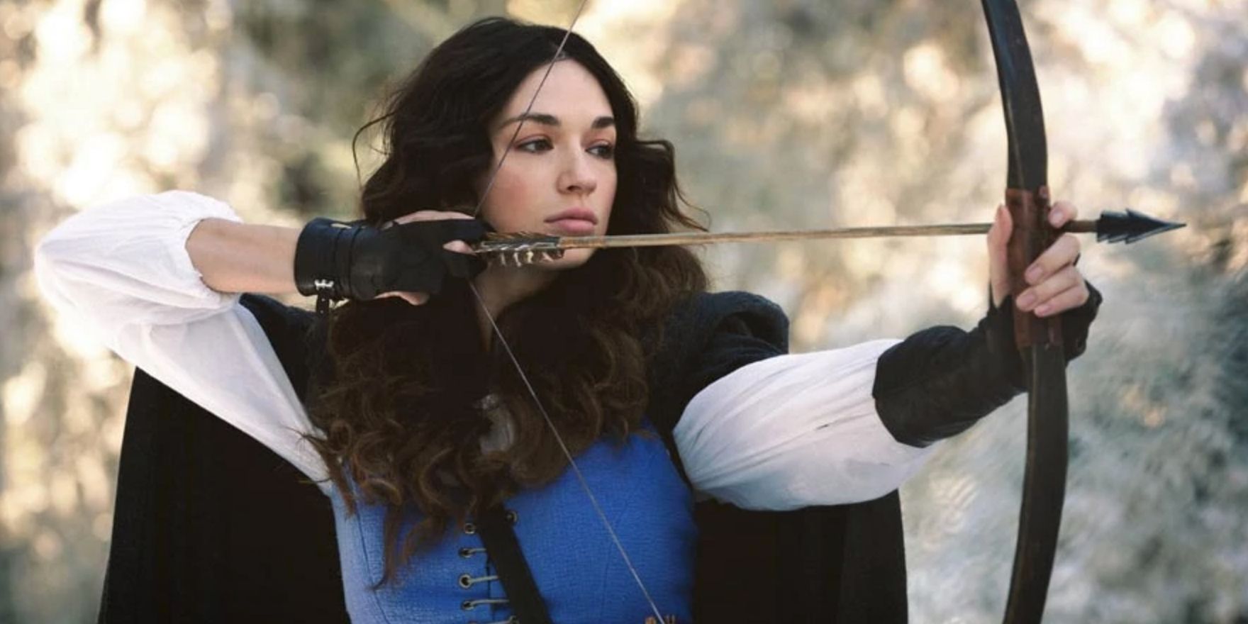 An image of Marie-Jeanne firing an arrow in Teen Wolf