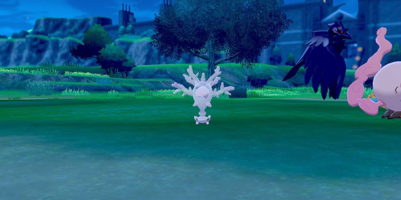 Cursola appears in a field in Pokémon Sword and Shield