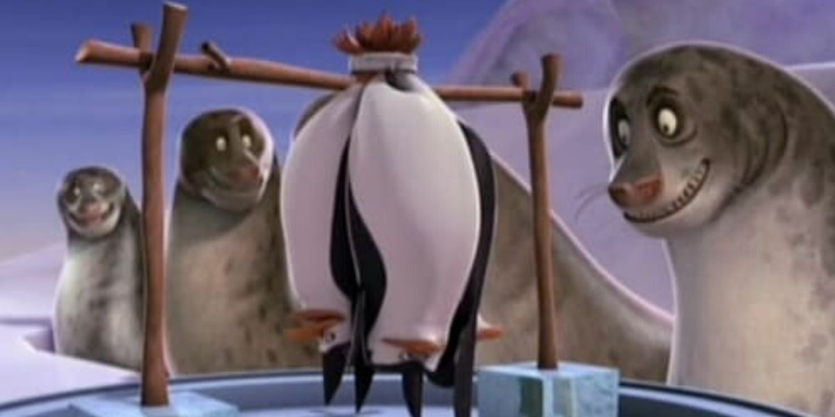 Penguins Of Madagascar held upside down