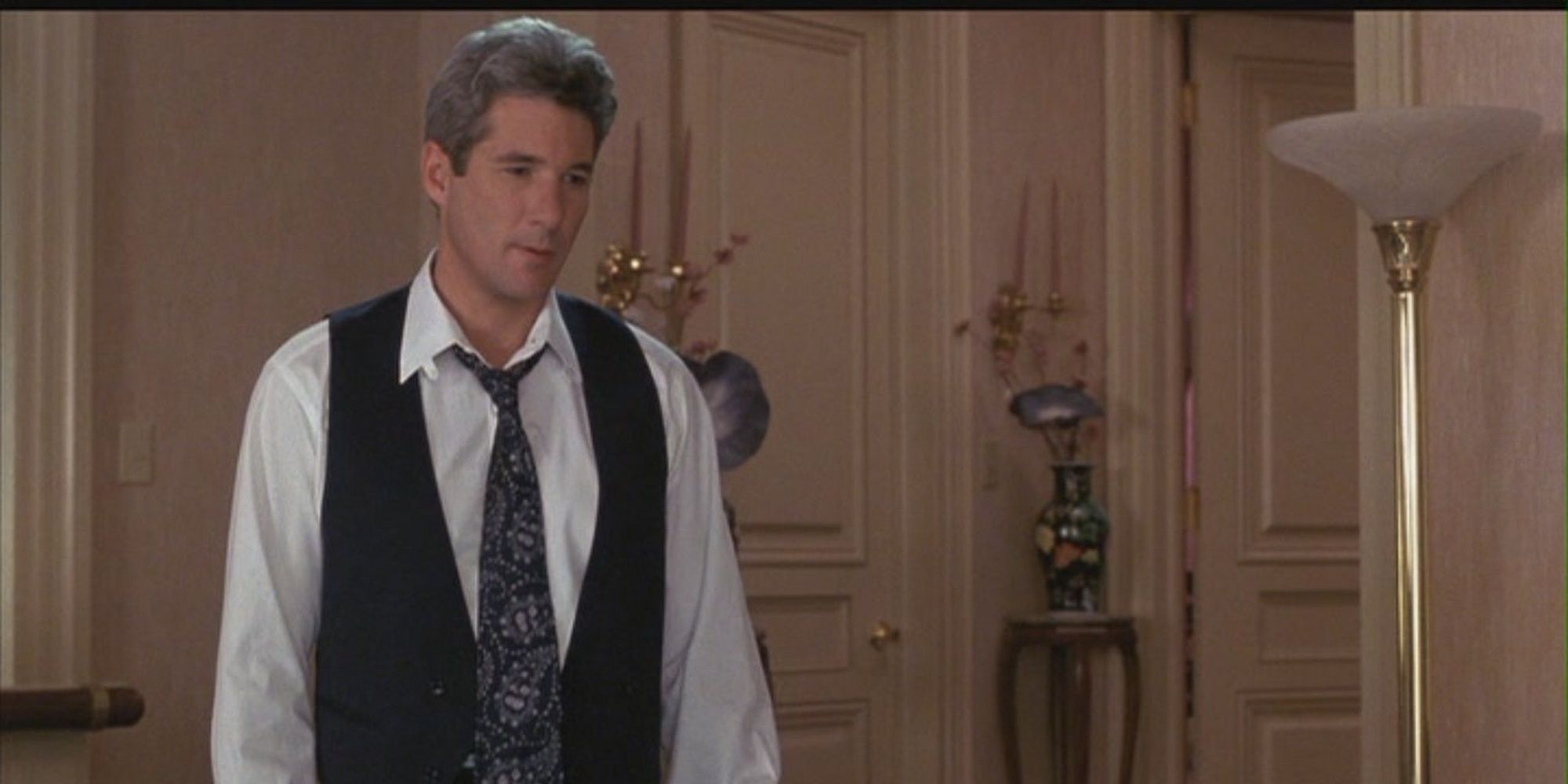 Edward standing in the hotel suite in Pretty Woman