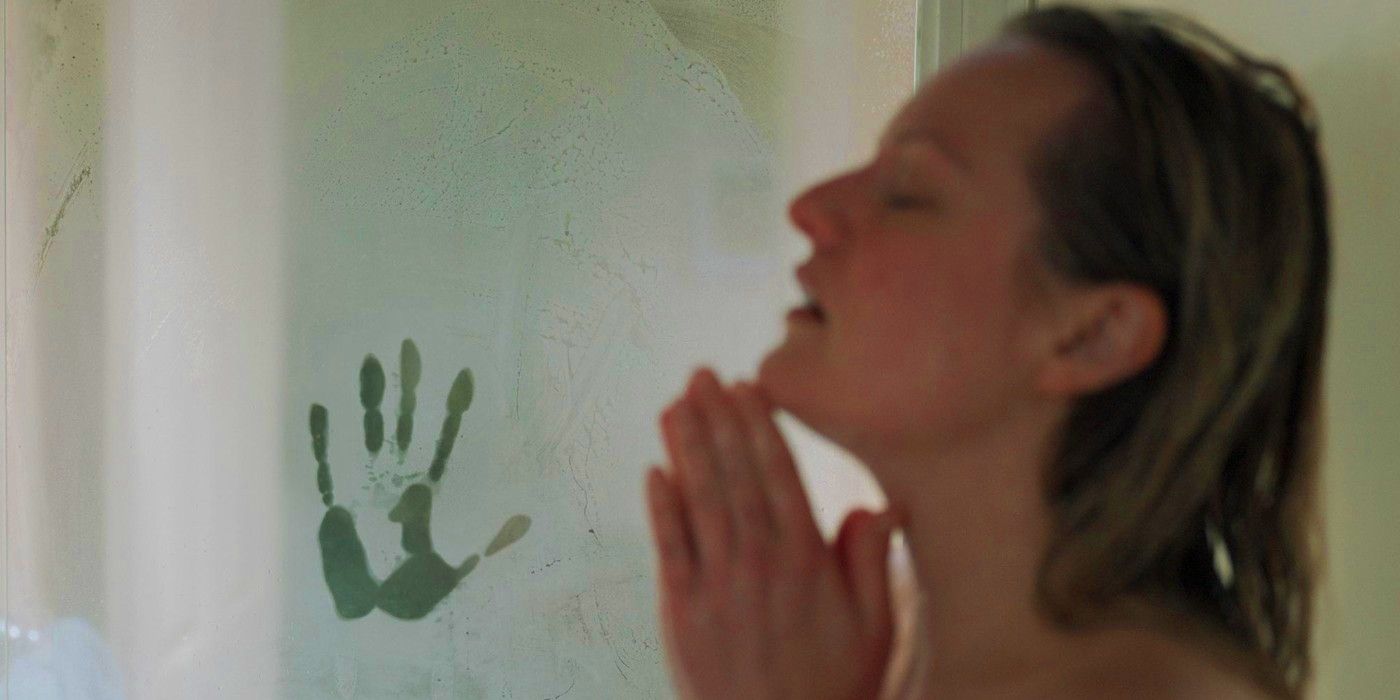 Uma impressão de mão no vidro do chuveiro em O Homem Invisível