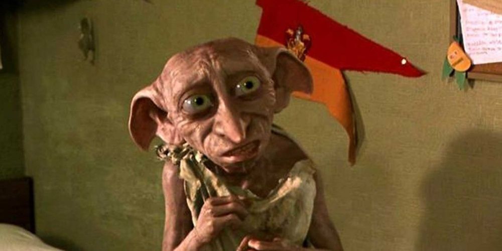 Dobby on Harry's bed in Chamber of Secrtes