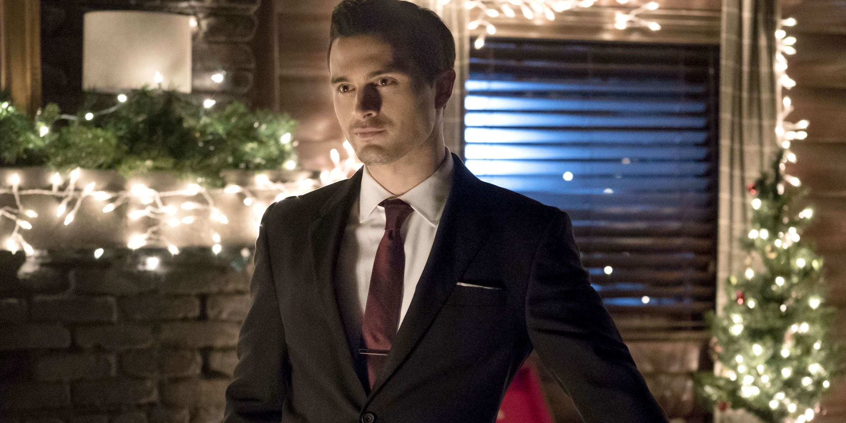 Enzo standing in a tuxedo in The Vampire Diaries