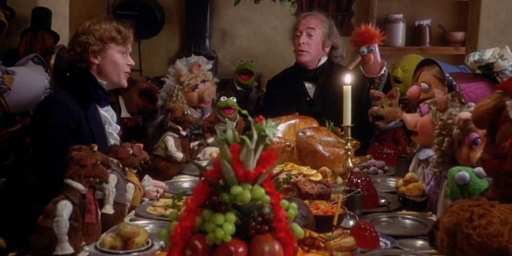 Fred Scrooge at the head of the table in The Muppet Christmas Carol