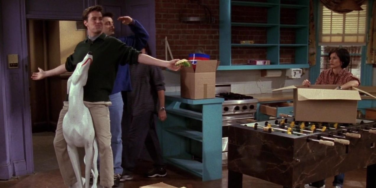 Joey and Chandler with white dog sculpture in Friends