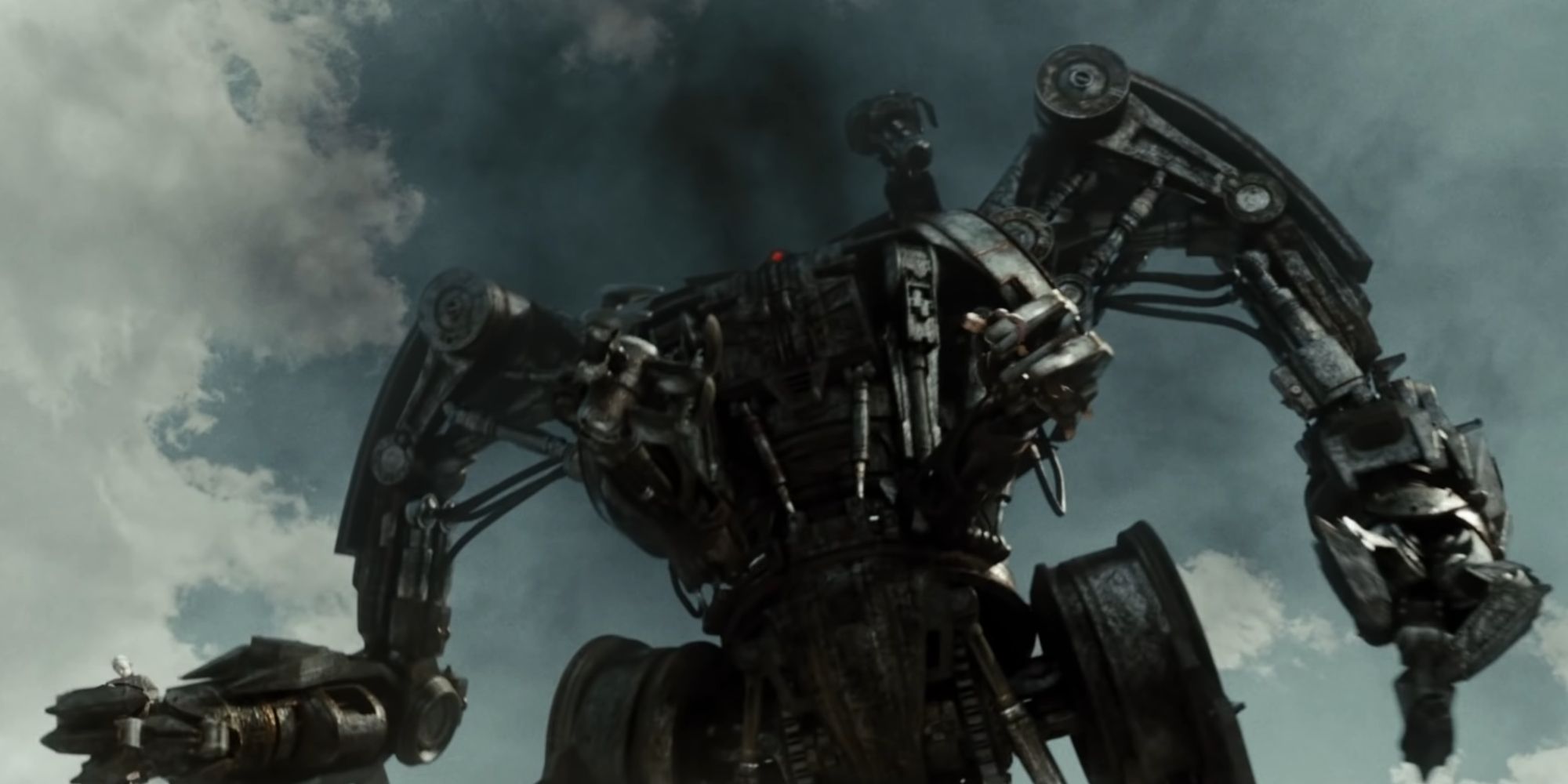 Harvester Terminator gathering humans while aiming shoulder cannon in Terminator Salvation