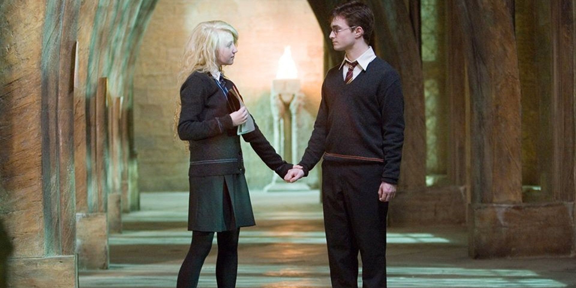 Harry and Luna holding hands
