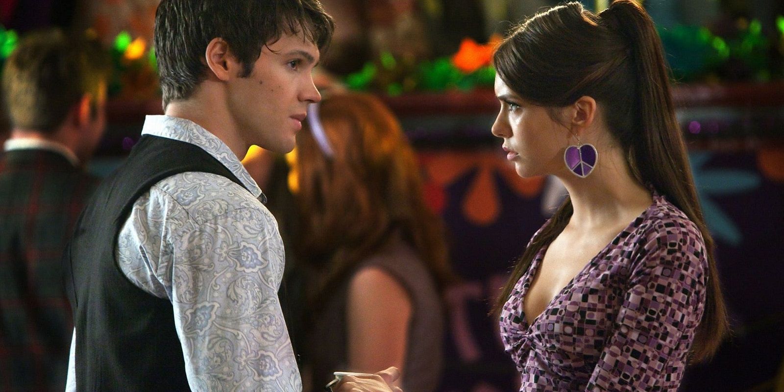 Jeremy and Elena talking at the school dance in The Vampire Diaries.