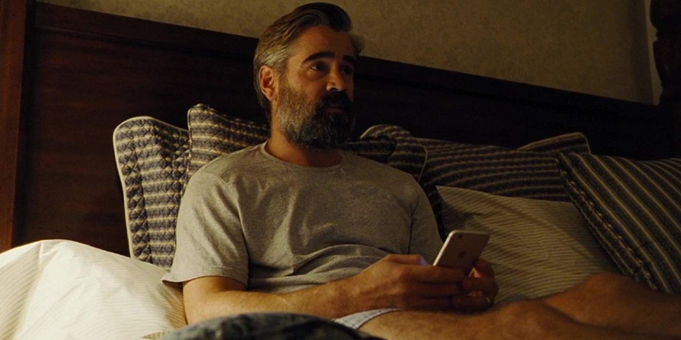 Colin Farrell in bed looking flabbergasted in the killing of a sacred deer.