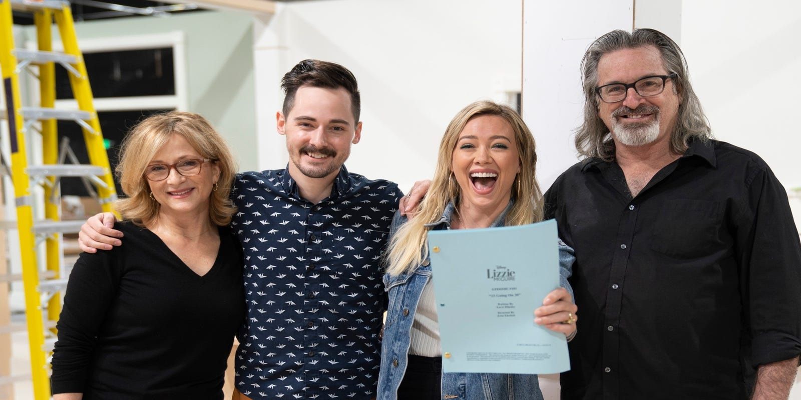 Hallie Todd, Jake Thomas, Hilary Duff, Robert Carradine holding script for the Lizzie McGuire reboot