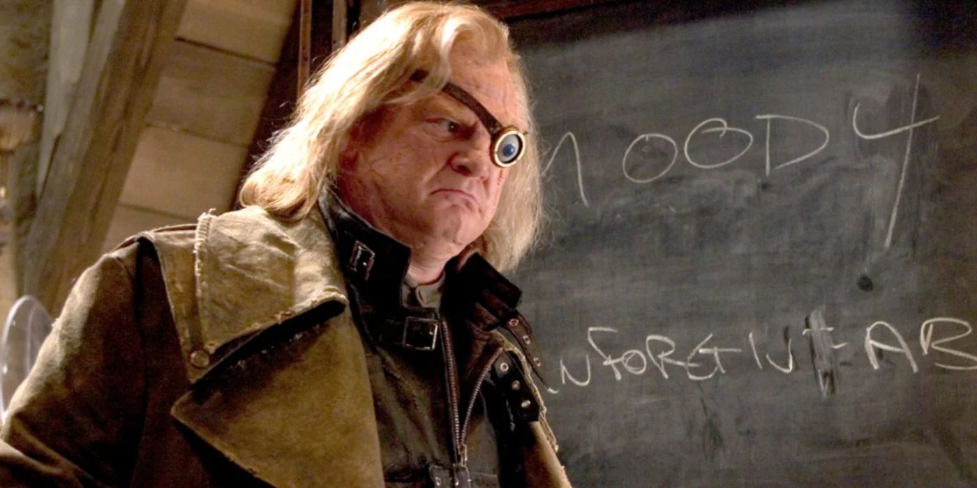 Mad-Eye Moody standing in front a blackboard in Harry Potter