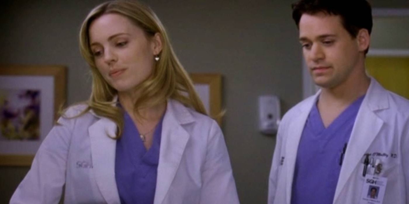 Two doctors speak to a patient in Grey's Anatomy