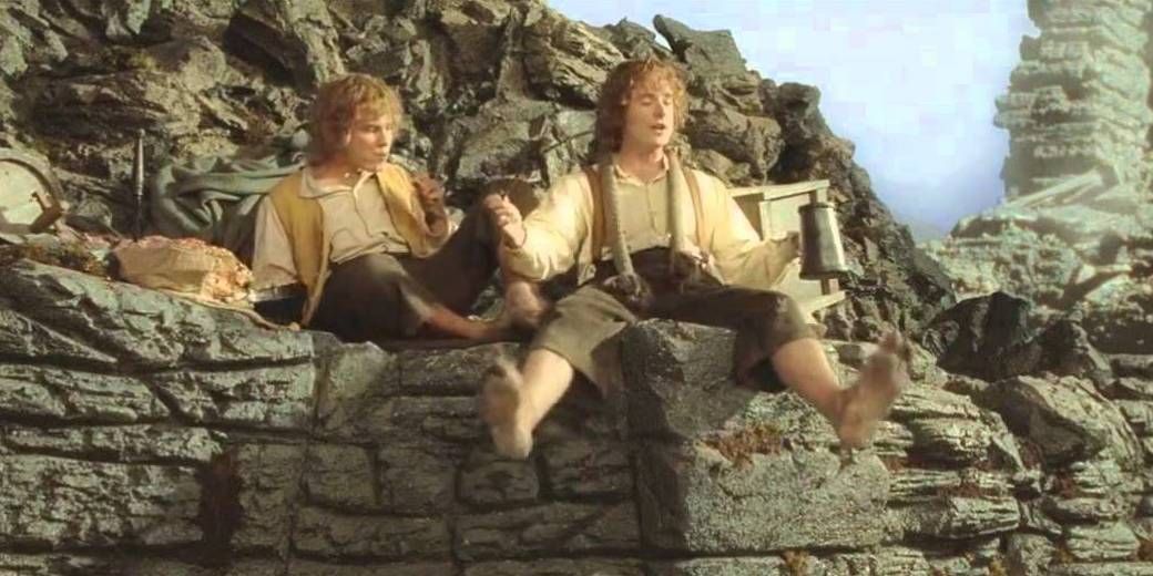 Merry and Pippin drinking on the ruins of Isengaard in The Lord of the Rings The Return of the King