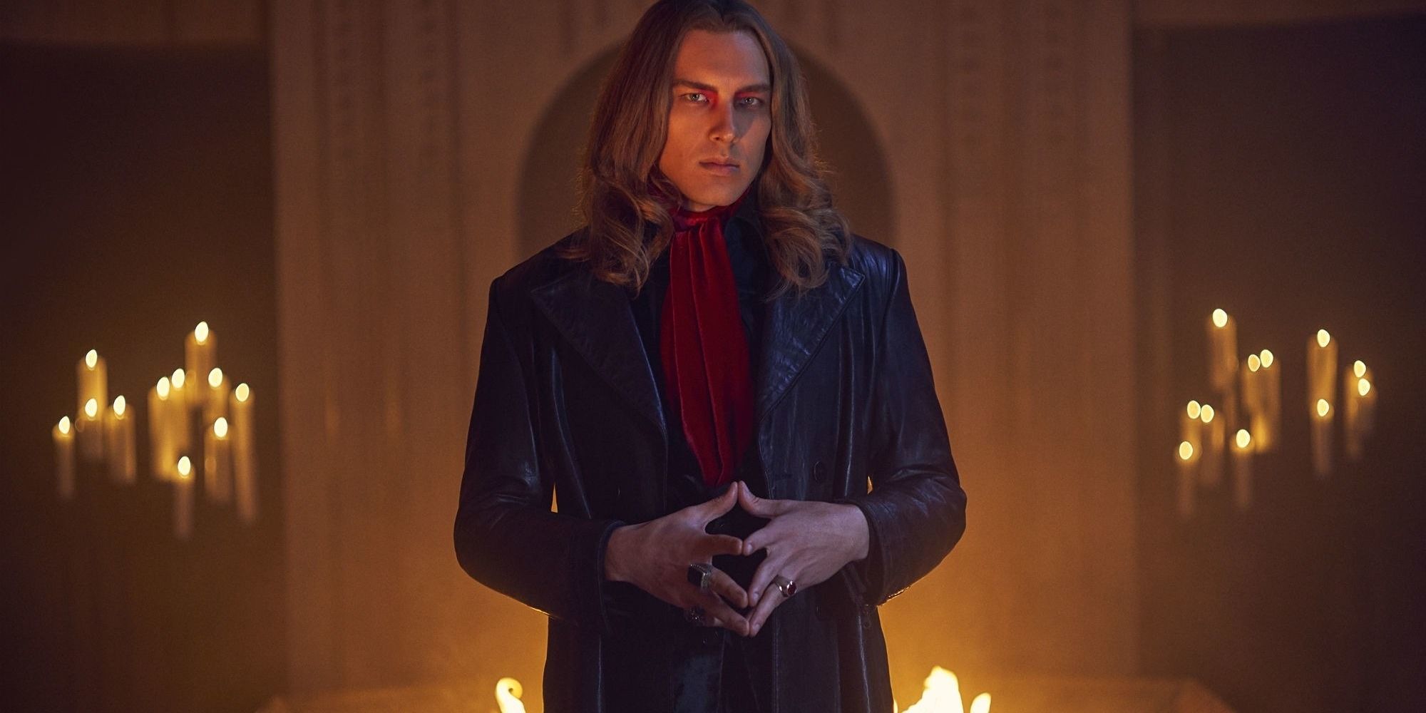 Cody Fern as Michael Langdon in a candlelit room