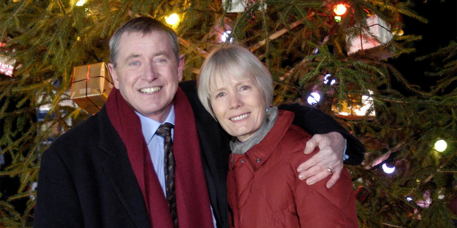 Tom and Joyce Barnaby in front of a Christmas tree in Midsomer Murders