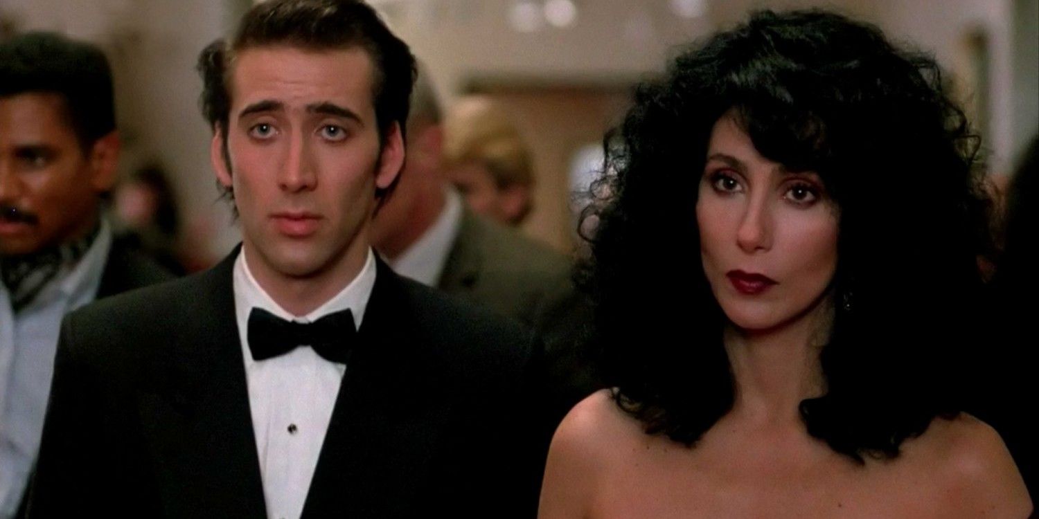 Ronny and Loretta stand together in formal attire in Moonstruck