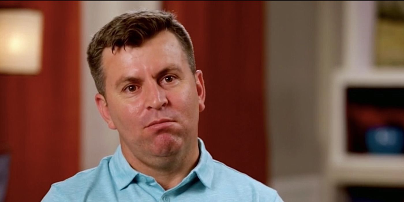 Mursel 90 Day Fiance serious expression wearing blue shirt
