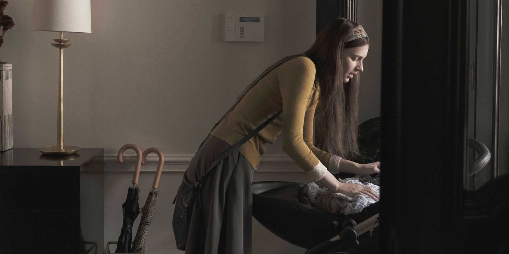 Nell Tiger Free tending to a baby in Servant