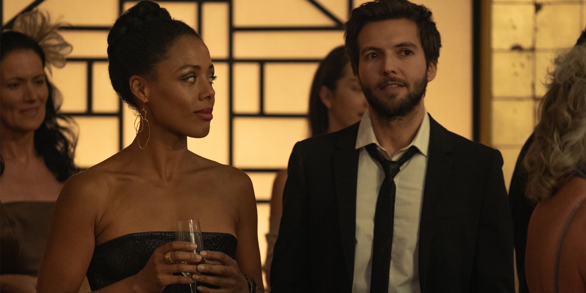 Nina Toussaint-White and Guy Burnet in a video for Amazon Prime Feed