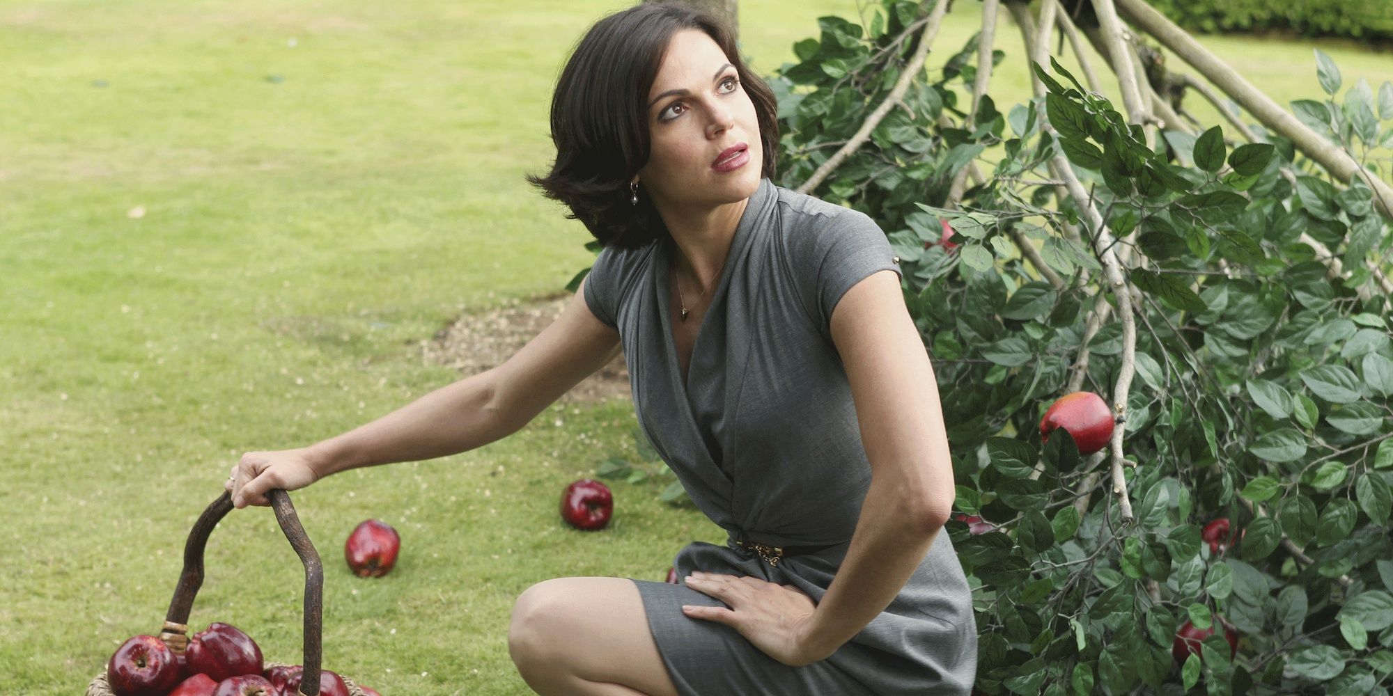 Regina Mills picking apples in Once Upon A Time.