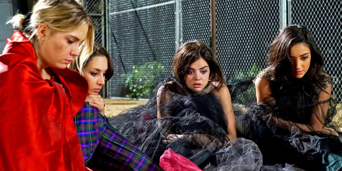 Hanna, Spencer, Aria, and Emily dirty and sitting outside on Pretty Little Liars